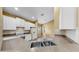 Well-lit kitchen showcasing ample counter space, tile floors, and modern white appliances at 8603 Sandy Plains Dr, Riverview, FL 33578