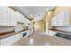 Spacious kitchen with tiled floor, white appliances, and access to the main living areas at 8603 Sandy Plains Dr, Riverview, FL 33578