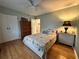 Cozy bedroom with a queen bed, nightstand, and closet, perfect for relaxation and rest at 8651 10Th N St # 236, St Petersburg, FL 33702