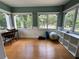 Brightly lit workout room with multiple windows overlooking pool area at 8651 10Th N St # 236, St Petersburg, FL 33702