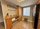 Bright, efficient kitchen with stainless steel refrigerator, good counterspace and a window at 8651 10Th N St # 236, St Petersburg, FL 33702