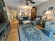 Spacious living room with hardwood floors, comfortable seating, and plenty of natural light at 8651 10Th N St # 236, St Petersburg, FL 33702