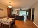 Inviting living room with hardwood floors and a dining table at 8651 10Th N St # 236, St Petersburg, FL 33702