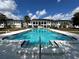 Large, sparkling pool with crystal-clear water offers residents a refreshing oasis for relaxation and recreation at 8651 10Th N St # 236, St Petersburg, FL 33702