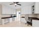 Bright office space with custom white cabinets and a dark countertop, offering ample workspace at 102 Adriatic Ave, Tampa, FL 33606