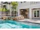 Beautiful pool and spa area, complemented by an outdoor kitchen and covered patio at 102 Adriatic Ave, Tampa, FL 33606