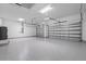Spacious garage with two metal doors and epoxy floors, great for storage and parking at 10493 Grail Ave, Englewood, FL 34224