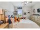 Inviting bedroom featuring natural light, soft bedding and decorative accents, creating a cozy and serene atmosphere at 10816 Wendover Dr, Palmetto, FL 34221