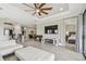 Bright living area featuring modern decor, wood-look tile flooring, and open floorplan at 10816 Wendover Dr, Palmetto, FL 34221