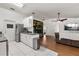 Open-concept kitchen and living area with modern appliances and a stylish design at 1108 16Th Nw Ave, Clearwater, FL 33756