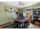 Bright office with hardwood floors, a ceiling fan, modern desk, a window, and a comfortable chair at 1108 16Th Nw Ave, Clearwater, FL 33756