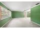 Bright living room with large windows and neutral carpet flooring at 1340 Whispering Pines Dr, Clearwater, FL 33764