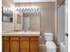 Full bathroom featuring cultured marble countertop, tile flooring, and tub/shower combo with a sliding door at 13777 Forest Lake Dr, Largo, FL 33771