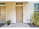 Close-up of townhouse front door with address at 13777 Forest Lake Dr, Largo, FL 33771