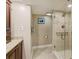 Bathroom featuring a vanity, mirror and glass shower at 1480 Gulf Blvd # 103, Clearwater Beach, FL 33767