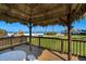 Relax in the shade of this gazebo with beach views and seating, perfect for enjoying the scenery at 1480 Gulf Blvd # 103, Clearwater Beach, FL 33767