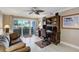 Office features a ceiling fan, desk with computer and ocean view at 1480 Gulf Blvd # 103, Clearwater Beach, FL 33767