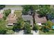 Aerial view of a home showcasing its roof, yard, and surrounding neighborhood at 15118 Brushwood Dr, Tampa, FL 33624