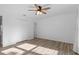 This bedroom is spacious with vinyl wood flooring and plenty of natural light at 15118 Brushwood Dr, Tampa, FL 33624