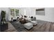 Bright living room features stylish furniture, hardwood floors, and natural light from a large window at 15118 Brushwood Dr, Tampa, FL 33624