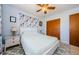 Neutral bedroom with a ceiling fan, a queen bed, and a closet in a home at 1524 Lemon St, Clearwater, FL 33756