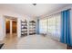 Bright living room with a cozy rug and large window that allows ample natural light at 1524 Lemon St, Clearwater, FL 33756