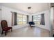 Serene sun room with lots of natural light overlooking the backyard at 1524 Lemon St, Clearwater, FL 33756