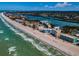 Beautiful aerial view of the coastline showing the beachfront community and clear blue waters at 19440 Gulf Blvd # 306, Indian Shores, FL 33785
