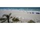 Picturesque beach with white sand and clear ocean views, showcasing the beautiful coastal scenery at 19440 Gulf Blvd # 306, Indian Shores, FL 33785