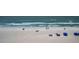 Stunning beach view with people enjoying the sunshine and clear blue waters, ideal for relaxation at 19440 Gulf Blvd # 306, Indian Shores, FL 33785
