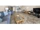 Cozy living room with comfortable seating, and a view of the kitchen and dining area at 19440 Gulf Blvd # 306, Indian Shores, FL 33785