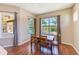 Cozy dining area with pool views and abundant natural light at 2250 Mountain Ash Way, New Port Richey, FL 34655