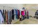 Walk-in closet with wire shelving and plenty of storage space at 2250 Mountain Ash Way, New Port Richey, FL 34655