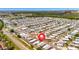 Wide aerial shot of the community, displaying dense housing and nearby waterways at 262 S Port Royal Ln, Apollo Beach, FL 33572