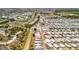 Wide aerial shot presenting a sprawling mobile home community with amenities close to the coastal highway at 262 S Port Royal Ln, Apollo Beach, FL 33572