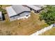 An aerial view of the home's backyard with white fence at 262 S Port Royal Ln, Apollo Beach, FL 33572