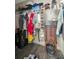Full walk-in closet with hanging clothes and storage at 262 S Port Royal Ln, Apollo Beach, FL 33572