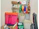 Organized closet with shelving, storage bins and rods for hanging clothes and storage at 262 S Port Royal Ln, Apollo Beach, FL 33572