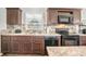 The kitchen offers stainless steel appliances, and ample counter space at 262 S Port Royal Ln, Apollo Beach, FL 33572