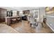 An open floor plan featuring a kitchen with an island and adjacent dining area for convenient living at 262 S Port Royal Ln, Apollo Beach, FL 33572