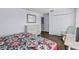 Bedroom features a dresser, a sitting area, and natural lighting at 27549 Stonecreek Way, Wesley Chapel, FL 33544