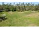 View of the community soccer field complete with goals, surrounded by mature landscaping at 27549 Stonecreek Way, Wesley Chapel, FL 33544