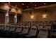 Home theater room with comfortable seating and ambient lighting at 27549 Stonecreek Way, Wesley Chapel, FL 33544
