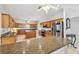 Large kitchen featuring stainless steel appliances, custom cabinets, and island at 284 Peninsula Ave, Tarpon Springs, FL 34689