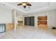 Open-concept living space with sleek tile flooring and a modern design at 284 Peninsula Ave, Tarpon Springs, FL 34689