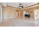 Spacious main bedroom with tile flooring and a ceiling fan at 284 Peninsula Ave, Tarpon Springs, FL 34689