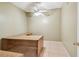 Office space with built-in wooden desk and tile floors at 284 Peninsula Ave, Tarpon Springs, FL 34689