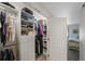Well-organized walk-in closet offering ample storage and easy access to bedroom at 2900 Cove Cay Dr # 1B, Clearwater, FL 33760