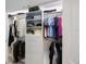 Spacious closet filled with organized clothing, providing efficient storage solutions at 2900 Cove Cay Dr # 1B, Clearwater, FL 33760