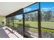 Enjoy serene views from this screened lanai, perfect for relaxing and taking in the beautiful outdoor scenery at 2900 Cove Cay Dr # 1B, Clearwater, FL 33760